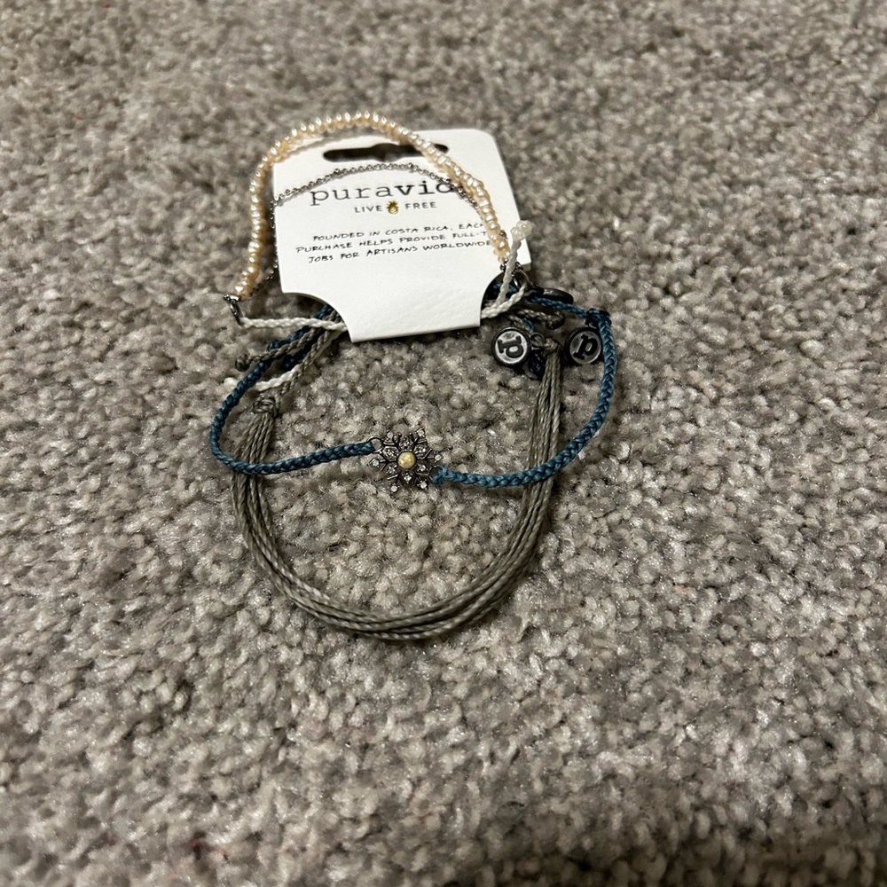 Set of three Puravida bracelets.